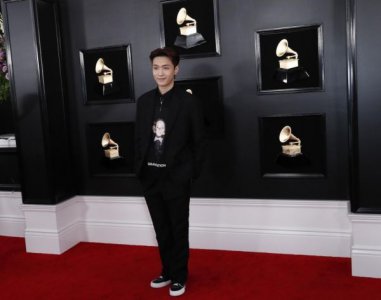 ​中国歌手张艺兴首度亮相格莱美 表示期待Lady Gaga的表演